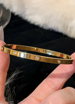 AuraBracelet™ – Titanium Gold Bracelet with Zircon