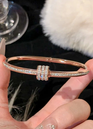 AuraBracelet™ – Titanium Gold Bracelet with Zircon